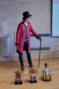 Ragazzo con cilindro e robot stilizzati